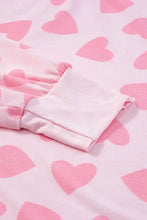 Pink heart print fleece pajama set with long sleeve top and shorts length
