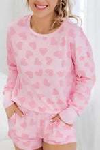 Pink heart print fleece pajama set with long sleeve top and shorts length