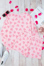 Pink heart print fleece pajama set with long sleeve top and shorts length