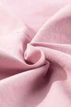 Soft pink cotton fabric in knot straps denim overalls with white tank top