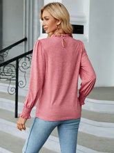 Women’s round neck flounce sleeve length blouse in pink with smocked cuffs