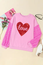 Pink long sleeve love heart sequin sweatshirt with red heart graphic
