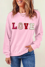 Pink love patch round neck dropped shoulder sequin sweatshirt