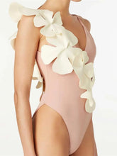 Pink One Piece Swimsuit with White Floral Embellishments