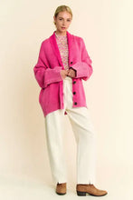 Pink oversized Dani shawl collar ribbed knit wool coat with black buttons