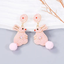Pink synthetic pearl alloy rabbit dangle earrings with pom-pom tails