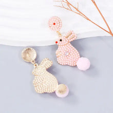 Pink pearl alloy rabbit dangle earrings with pom-pom tails and synthetic pearls