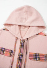Pink plaid oversized fleece hoodie with waffle texture, drawstring, pockets, and hood
