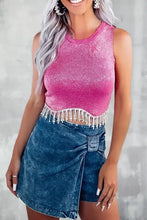 Pink sequined tank top with fringe hem and denim skirt