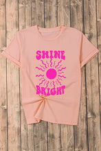 Pink Shine Bright graphic tee with sun design and knotted front