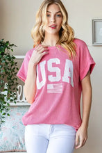 Pink short sleeve ribbed top with bold USA graphic