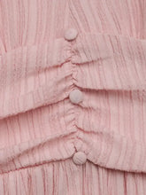 Pink stretch lace midi dress with pleated fabric, buttons and pom-poms