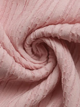 Pale pink stretch lace fabric in spiral texture for summer dress