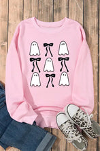 Pink sweatshirt with ghost print and black bows