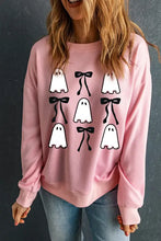 Pink long-sleeve sweatshirt with ghost print and black bows