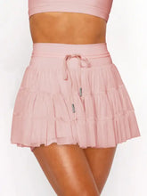 Pink tiered ruffle mini skort with built-in shorts
