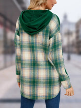 Woman in green beige plaid drawstring long sleeve slit hoodie