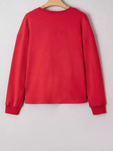 Red long-sleeved crew neck sweatshirt with ribbed cuffs featuring plaid frayed double christmas tree patch, machine wash cold