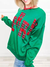 Green long-sleeved round neck sweatshirt with red plaid fir lettering machine wash cold recommended