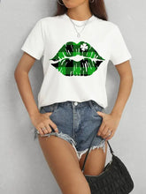 Women’s white short-sleeve plaid lip graphic round neck t-shirt with shamrock and distressed denim shorts