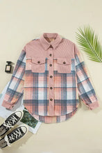 Plaid pink and white flannel shirt with denim shorts and crop top
