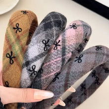 Set of four plaid polyester hair headbands with bow accents