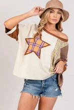 Plaid star patch round neck t-shirt with off-shoulder top, denim shorts, tan bucket hat