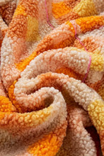 Orange and white plaid teddy bear throw blanket with pink accents