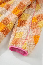 Pastel patchwork sherpa blanket with pink trim accents