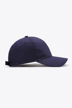 Plain adjustable cotton baseball cap in dark blue with curved brim