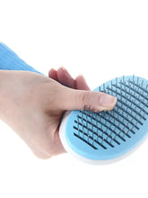 Light blue slicker brush with flexible wire bristles removes loose fur