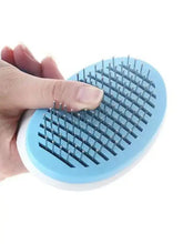 Light blue slicker brush with retractable metallic bristles for loose fur