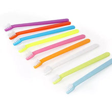 Colorful plastic pet toothbrush with soft white bristles