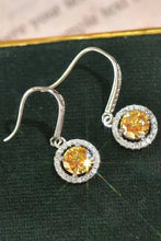 Platinum-plated 2 carat moissanite drop earrings with yellow gemstone halos
