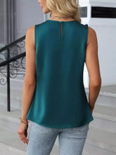 Teal sleeveless satin pleated round neck tank top shown from the back with zipper detail