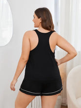 Plus size black tank top with racerback design and white trim along hemline from contrast piping lounge set back view