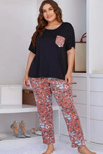 Plus size black short-sleeved round neck top with pink floral pocket from floral pants lounge set
