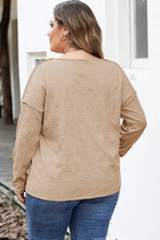 Plus size exposed seam dropped shoulder t-shirt in mocha brown with geometric pattern and blue jeans