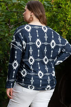 Plus size exposed seams round neck Aztec print long sleeve top