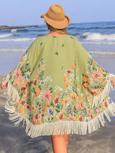 Plus size fringe open front cover-up with green floral print and fringe trim