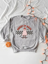 Plus size graphic round neck long sleeve sweatshirt with ghost skateboard design