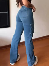 Plus size high-waisted blue denim cargo jeans with flared leg and cargo pockets for casual wear
