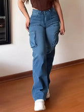 Plus size high-waisted cargo jeans in blue denim with wide legs and multiple pockets for a trendy look