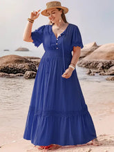 Plus size lace maxi dress with tie neck short sleeve and ruffled hem