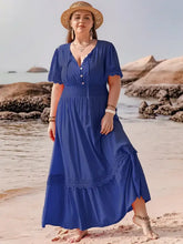 Plus size lace maxi dress with tie neck short sleeve and lace trim