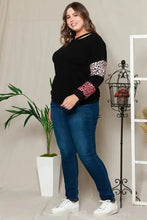 Plus size leopard dropped shoulder long sleeve black top with pink accents