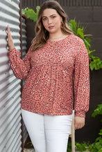 Plus size leopard long sleeve t-shirt in peach with white pants