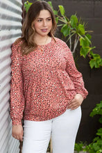 Plus size leopard long sleeve peplum top in pink print