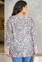 Plus size leopard print long sleeve sweatshirt with ribbed cuffs