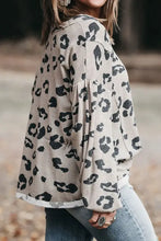 Plus size leopard V-neck waffle knit top with long balloon sleeves